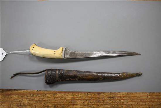 An Indian dagger pesh kabz, ivory grips, silver covered hilt and leather scabbard, late 18th century, overall length 31.5cm